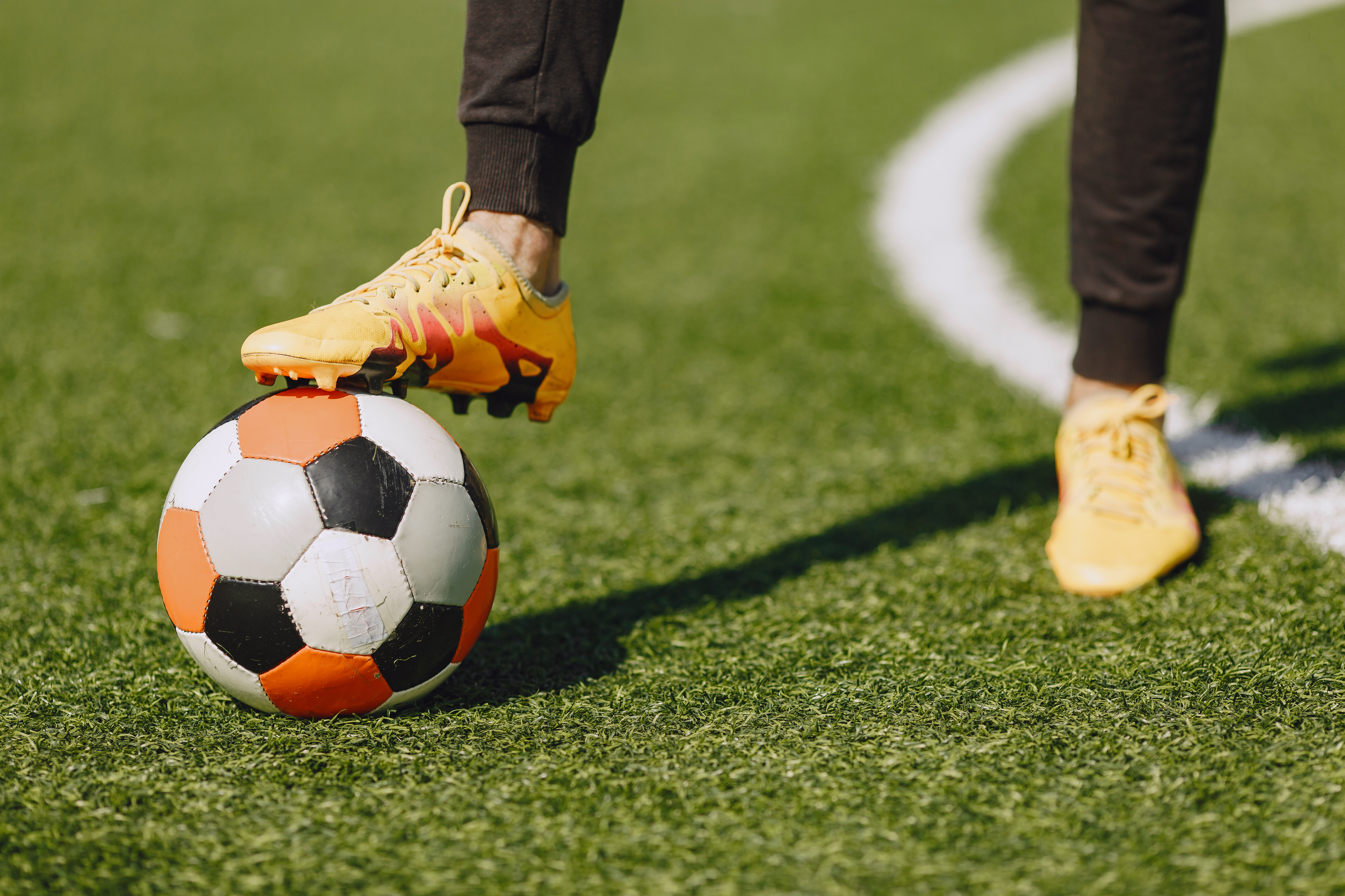 Father and son playing football